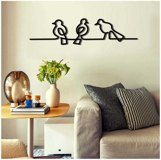 Wanddeko aus Metall mit drei kleinen Vögeln
