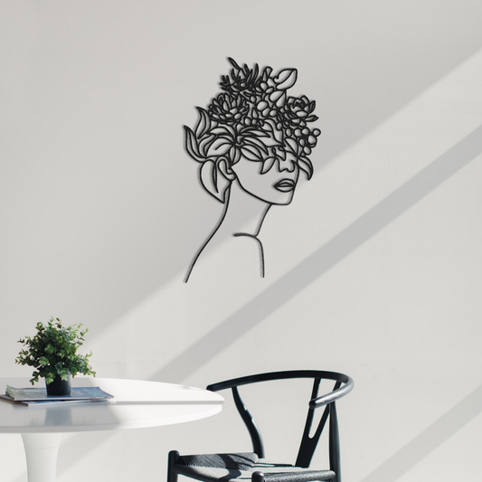 Déco murale en métal Femme avec des plantes sur la tête
